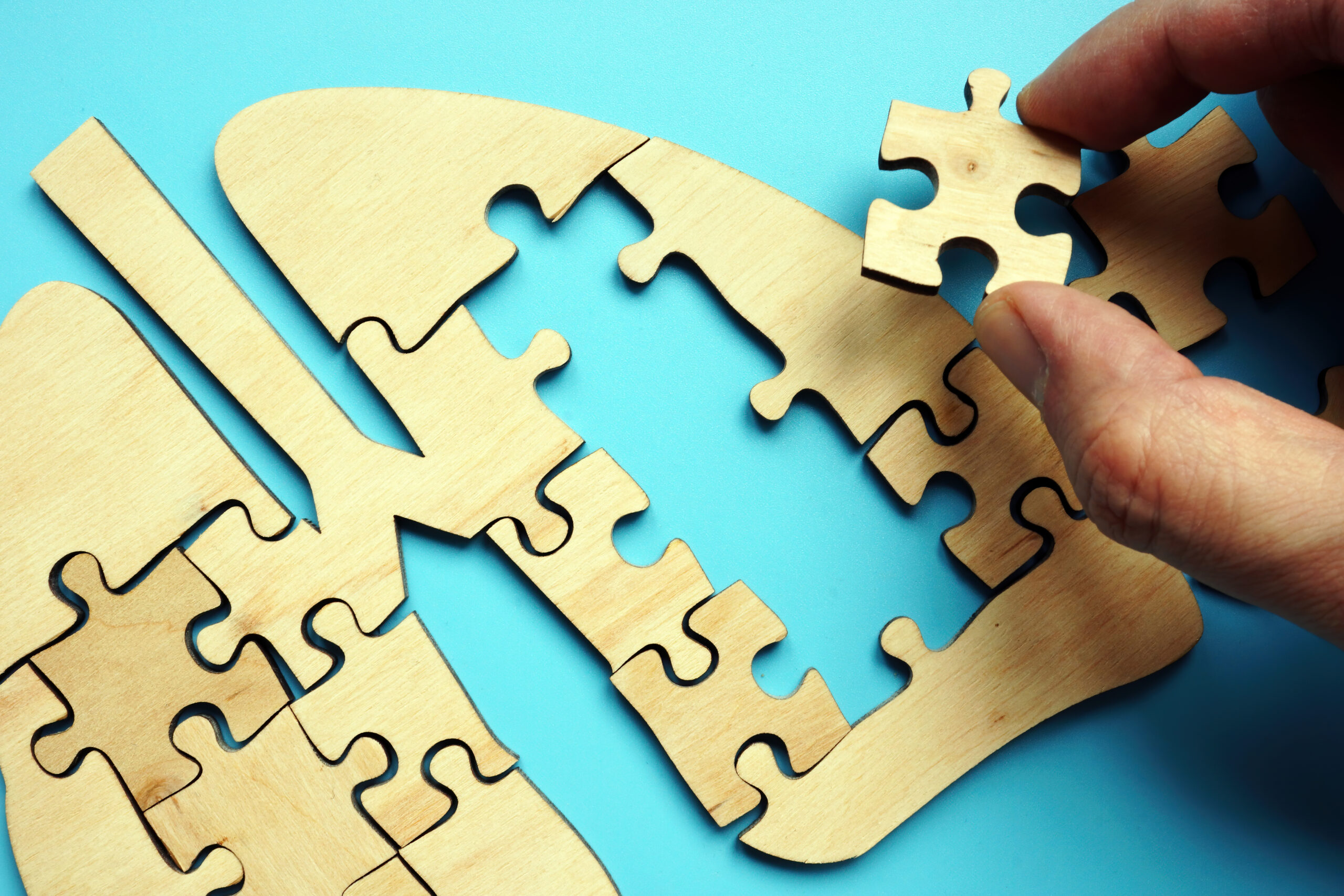 Lung disease treatment concept. Hand is putting the puzzle together.